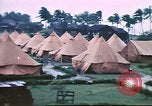 Image of U.S. Army bivouac deluged by rain in the Philippines Philippines, 1941, second 3 stock footage video 65675060835