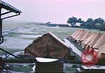 Image of U.S. Army bivouac deluged by rain in the Philippines Philippines, 1941, second 10 stock footage video 65675060835