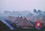 Image of U.S. Army bivouac deluged by rain in the Philippines Philippines, 1941, second 21 stock footage video 65675060835