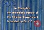 Standbild Arzt Yao und Rockefeller Institut Malaria Control in China während der W Mengshih China, 1941, aus Sekunde 57 historischem Filmmaterial Videoclip 65675060847