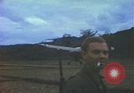Image of small planes land and take off China-Burma-India Theater, 1943, second 18 stock footage video 65675060852