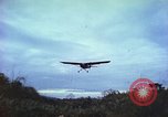 Image of small planes land and take off China-Burma-India Theater, 1943, second 44 stock footage video 65675060852
