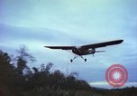 Image of small planes land and take off China-Burma-India Theater, 1943, second 46 stock footage video 65675060852