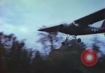 Image of small planes land and take off China-Burma-India Theater, 1943, second 47 stock footage video 65675060852