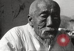 Standbild koreanischen Fluechtlinge Korea, 1952, aus Sekunde 28 historischem Filmmaterial Videoclip 65675061068
