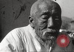 Standbild koreanischen Fluechtlinge Korea, 1952, aus Sekunde 29 historischem Filmmaterial Videoclip 65675061068