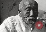 Standbild koreanischen Fluechtlinge Korea, 1952, aus Sekunde 30 historischem Filmmaterial Videoclip 65675061068