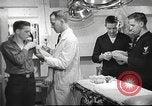 Image of navy personnel United States USA, 1953, second 23 stock footage video 65675061077