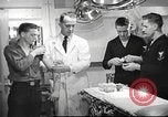 Image of navy personnel United States USA, 1953, second 26 stock footage video 65675061077