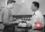 Image of navy personnel United States USA, 1953, second 59 stock footage video 65675061077