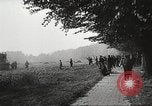 Image of scattered Allied equipment Netherlands, 1944, second 20 stock footage video 65675061173