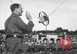 Standbild Adolf Hitler spricht auf 120 tausend Menschen in Erfurt Deutschland Erfurt Deutschland, 1933, aus Sekunde 58 historischem Filmmaterial Videoclip 65675061184