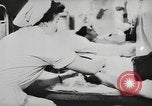 Image of blood donors Germany, 1944, second 14 stock footage video 65675061204