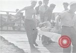 Image of survivors of USS Indianapolis CA-35 Peleliu Palau Islands, 1945, second 4 stock footage video 65675061232