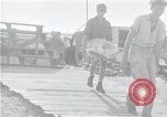Image of survivors of USS Indianapolis CA-35 Peleliu Palau Islands, 1945, second 8 stock footage video 65675061232