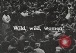 Image of World War 1 US soldiers watching drag queens perform France, 1918, second 3 stock footage video 65675061256