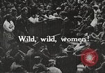 Image of World War 1 US soldiers watching drag queens perform France, 1918, second 4 stock footage video 65675061256