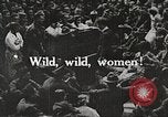 Image of World War 1 US soldiers watching drag queens perform France, 1918, second 5 stock footage video 65675061256