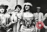 Image of World War 1 US soldiers watching drag queens perform France, 1918, second 13 stock footage video 65675061256