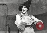 Image of World War 1 US soldiers watching drag queens perform France, 1918, second 27 stock footage video 65675061256