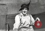 Image of World War 1 US soldiers watching drag queens perform France, 1918, second 28 stock footage video 65675061256