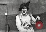 Image of World War 1 US soldiers watching drag queens perform France, 1918, second 29 stock footage video 65675061256