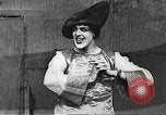 Image of World War 1 US soldiers watching drag queens perform France, 1918, second 30 stock footage video 65675061256