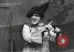 Image of World War 1 US soldiers watching drag queens perform France, 1918, second 32 stock footage video 65675061256