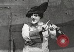 Image of World War 1 US soldiers watching drag queens perform France, 1918, second 33 stock footage video 65675061256