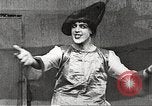 Image of World War 1 US soldiers watching drag queens perform France, 1918, second 35 stock footage video 65675061256
