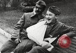 Image of World War 1 US soldiers watching drag queens perform France, 1918, second 45 stock footage video 65675061256