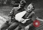 Image of World War 1 US soldiers watching drag queens perform France, 1918, second 47 stock footage video 65675061256