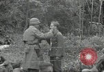 Standbild USA Soldaten Colleville-sur-Mer Normandie Frankreich, 1944, aus Sekunde 14 historischem Filmmaterial Videoclip 65675061291
