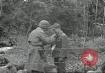 Standbild USA Soldaten Colleville-sur-Mer Normandie Frankreich, 1944, aus Sekunde 18 historischem Filmmaterial Videoclip 65675061291