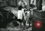 Image of poor farm family United States USA, 1940, second 60 stock footage video 65675061311