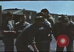 Image of Airmen amuse themselves pitching coins United Kingdom, 1943, second 10 stock footage video 65675061382