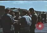 Image of Airmen amuse themselves pitching coins United Kingdom, 1943, second 13 stock footage video 65675061382