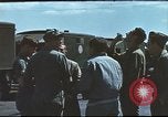 Image of Airmen amuse themselves pitching coins United Kingdom, 1943, second 20 stock footage video 65675061382