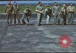 Image of Airmen amuse themselves pitching coins United Kingdom, 1943, second 40 stock footage video 65675061382