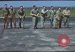 Image of Airmen amuse themselves pitching coins United Kingdom, 1943, second 41 stock footage video 65675061382