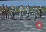 Image of Airmen amuse themselves pitching coins United Kingdom, 1943, second 42 stock footage video 65675061382