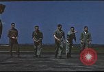 Image of Airmen amuse themselves pitching coins United Kingdom, 1943, second 45 stock footage video 65675061382