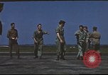 Image of Airmen amuse themselves pitching coins United Kingdom, 1943, second 47 stock footage video 65675061382