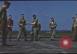 Image of Airmen amuse themselves pitching coins United Kingdom, 1943, second 50 stock footage video 65675061382