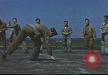 Image of Airmen amuse themselves pitching coins United Kingdom, 1943, second 52 stock footage video 65675061382