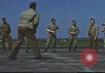 Image of Airmen amuse themselves pitching coins United Kingdom, 1943, second 53 stock footage video 65675061382