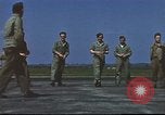 Image of Airmen amuse themselves pitching coins United Kingdom, 1943, second 54 stock footage video 65675061382