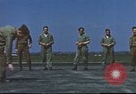 Image of Airmen amuse themselves pitching coins United Kingdom, 1943, second 57 stock footage video 65675061382