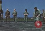 Image of Airmen amuse themselves pitching coins United Kingdom, 1943, second 59 stock footage video 65675061382