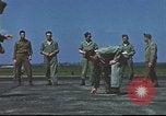 Image of Airmen amuse themselves pitching coins United Kingdom, 1943, second 60 stock footage video 65675061382